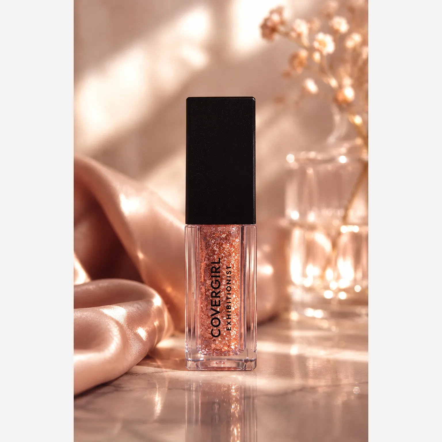 سایه مایع گلیتری برند آمریکایی کاورگرل رنگ رزگلد covergirl